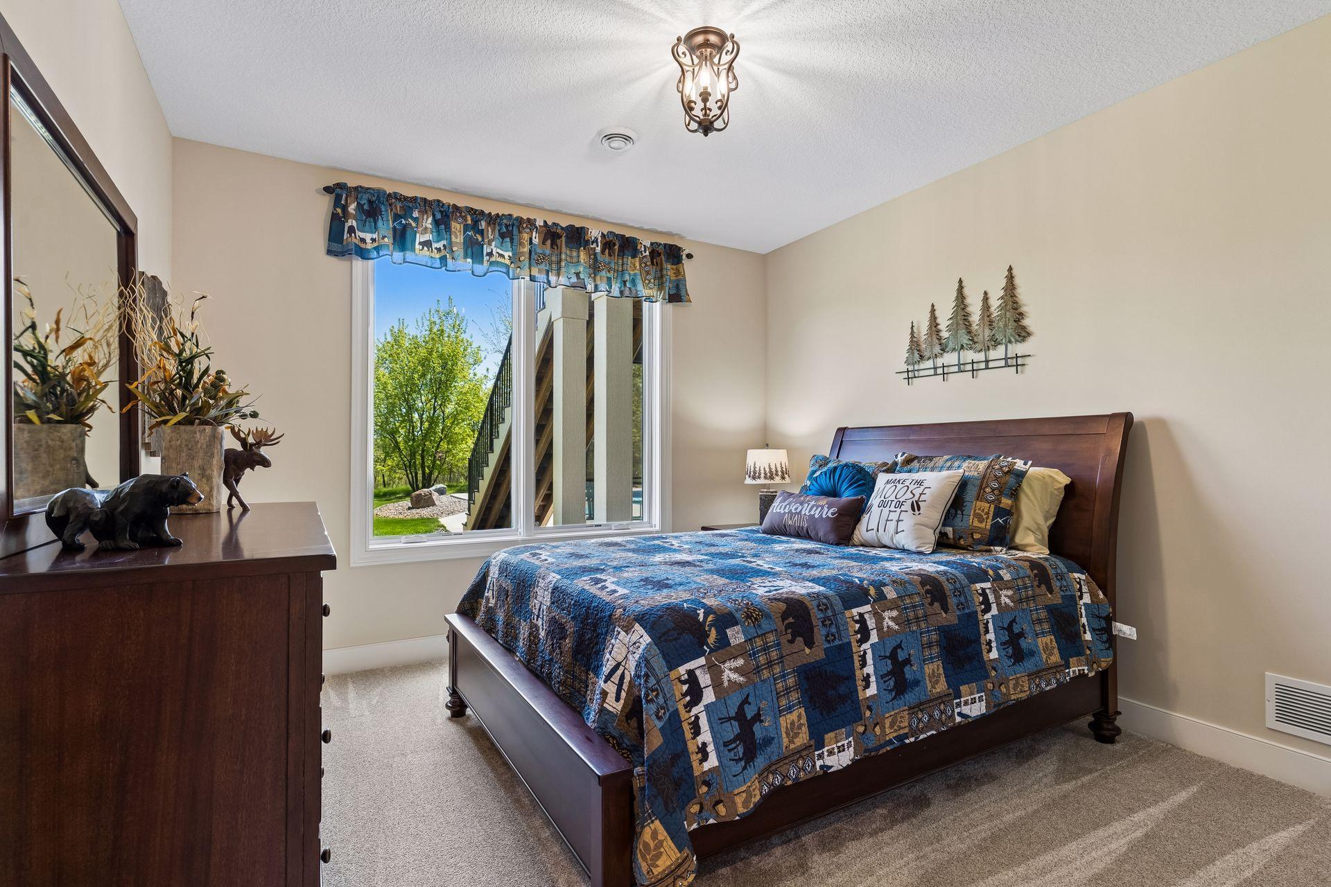 A second lower-level bedroom adds excellent flexibility for guests, family, or extended-stay accommodations.