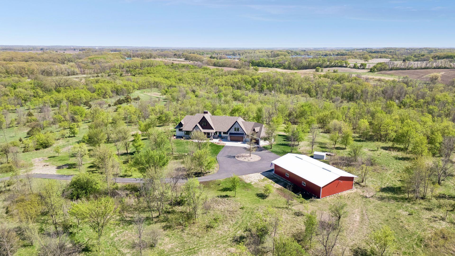 Surrounded by rolling Minnesota countryside, the insulated and heated 64*40 pole barn is ready for business use, storage, hobbies, or showcasing an impressive car, tractor, or recreational collection.