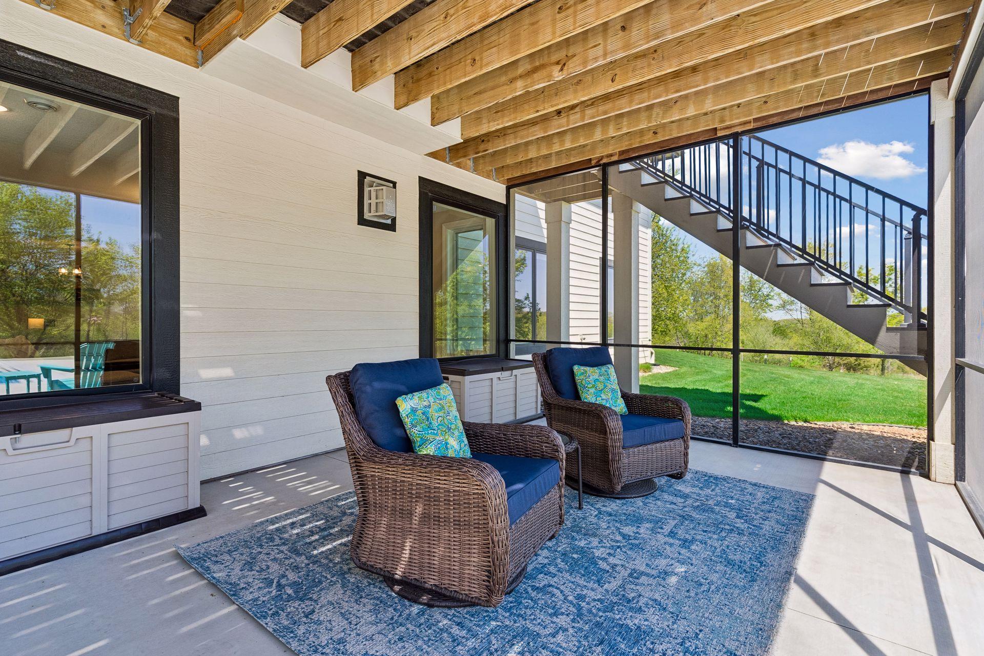 Screened lower patio offers a quiet place to unwind with protection from the elements.