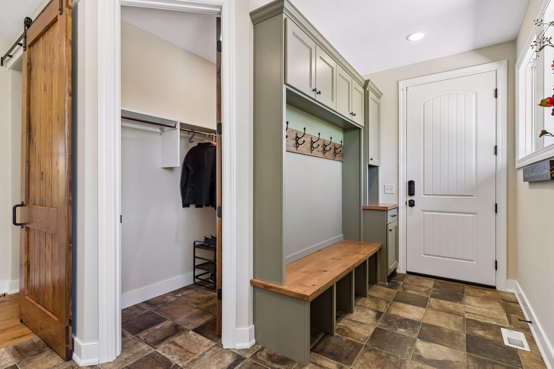 Large garage entrance, mud room includes a 'friends' entrance and Large walk in closet.jpg