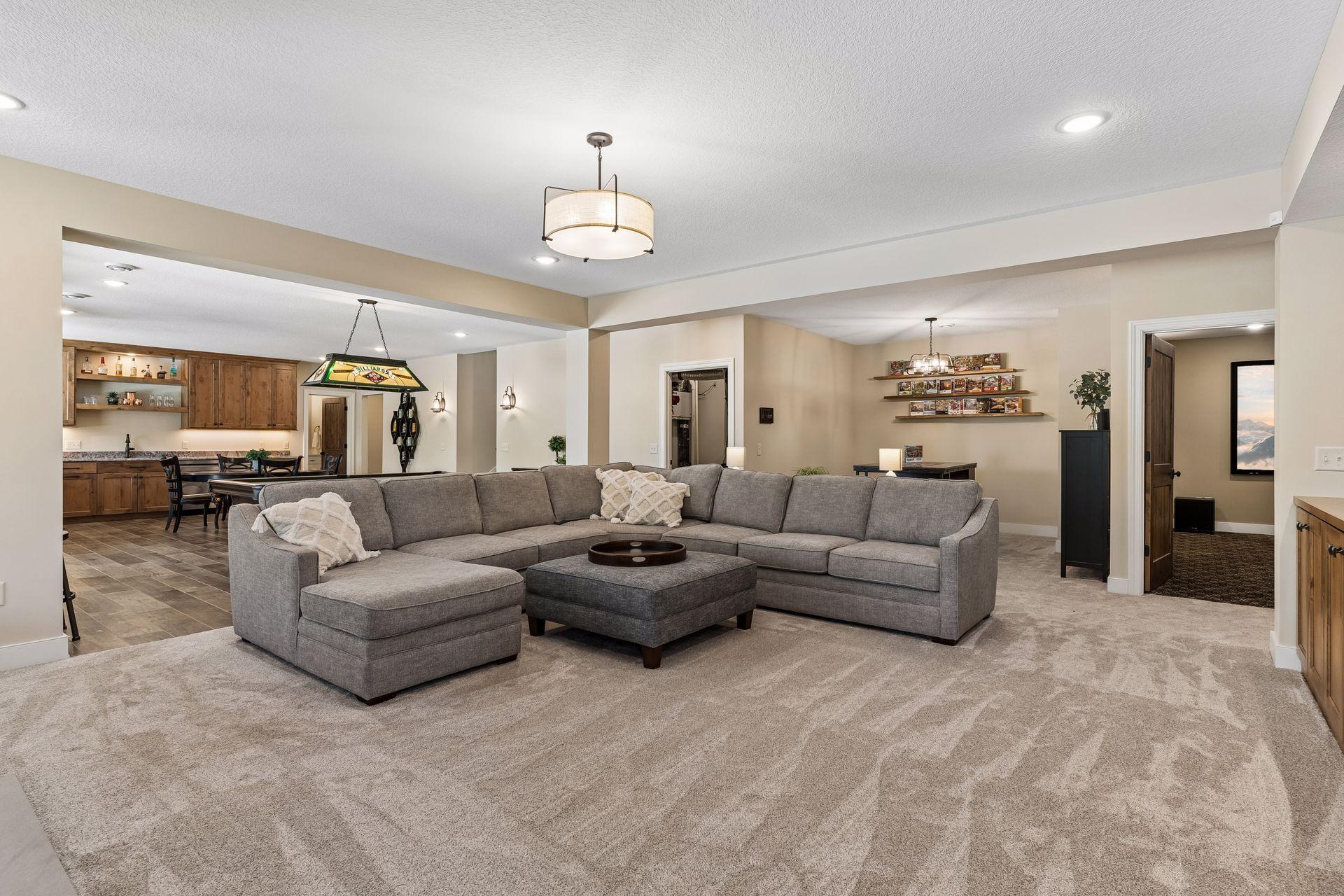 expansive lower level family room open to 2nd kitchen, great for entertaining.jpg