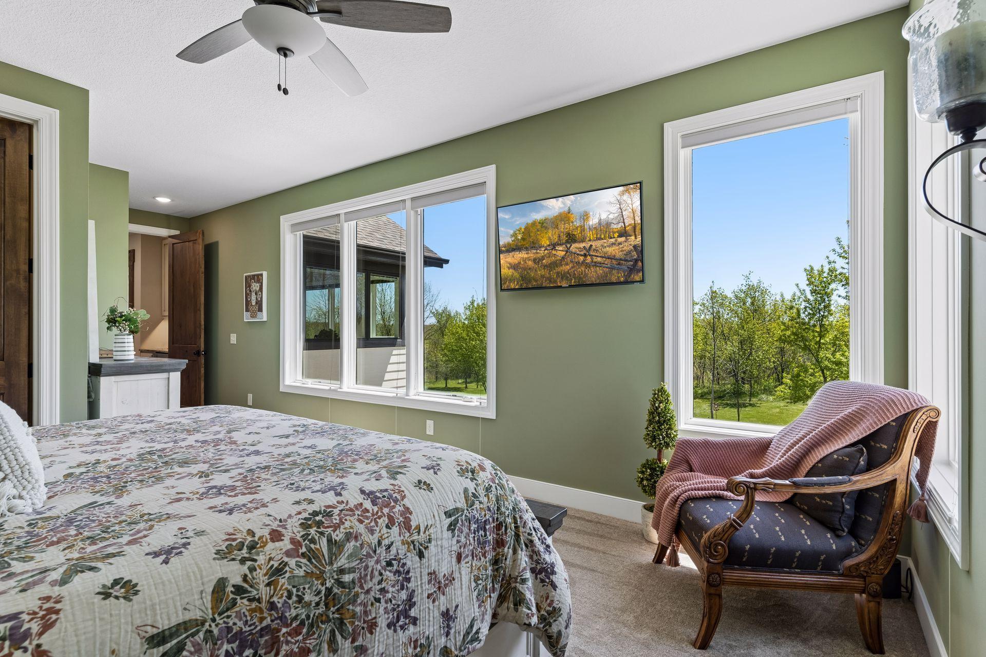Second bedrrom on main lever with walk in closet and private in suite bathroom.jpg