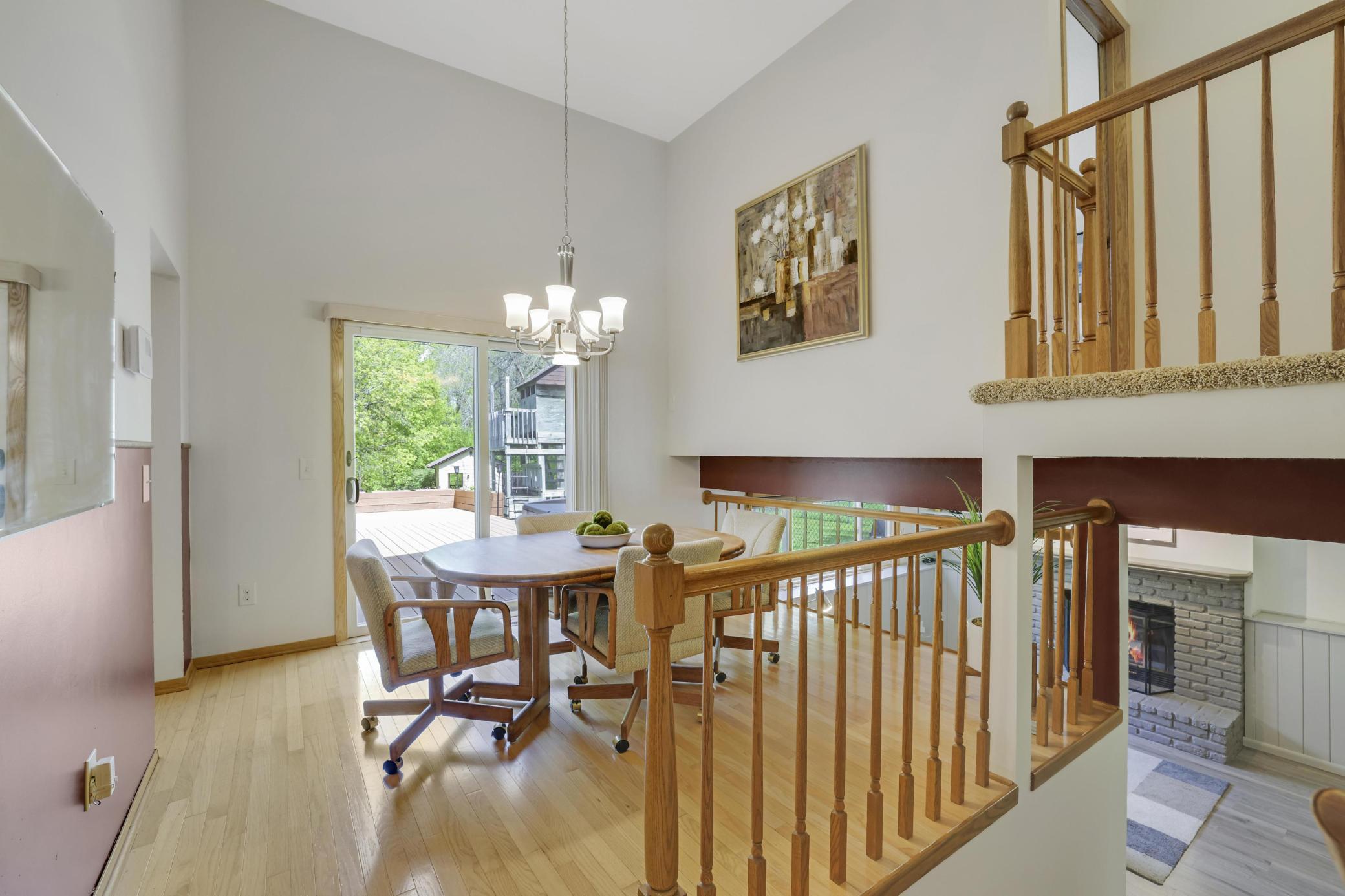 Dinette area off the kitchen with patio door out to the deck.