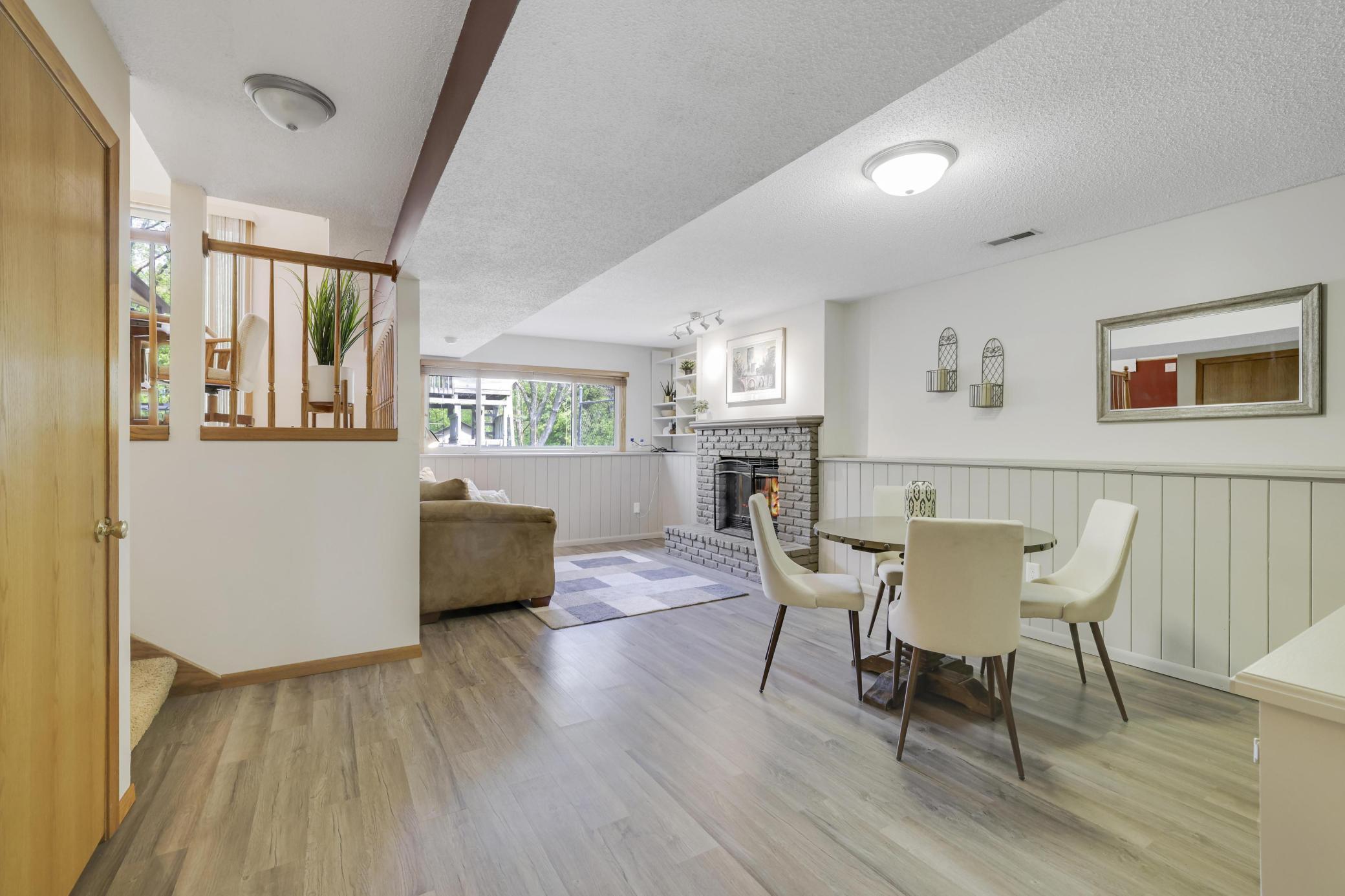Lower level family room with fireplace.