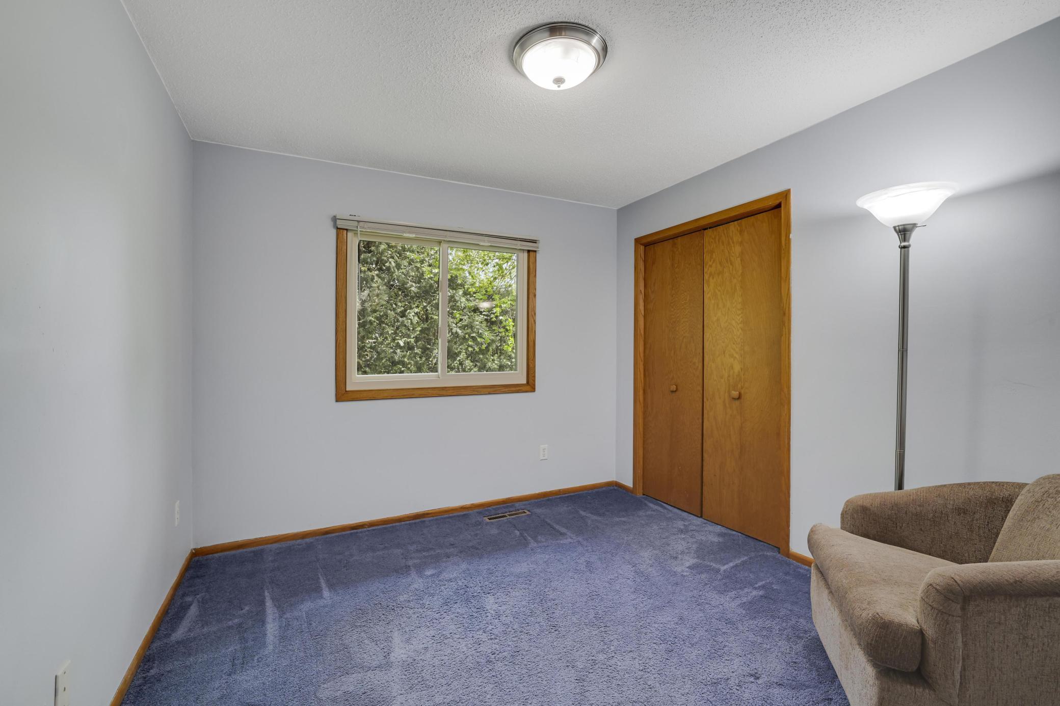 Third upper level bedroom.