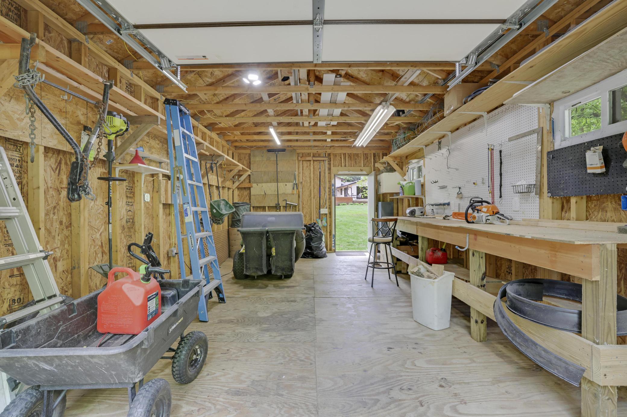 Large 14 x 24 Storage/Garden shed with built in workbench and 9' ceilings.