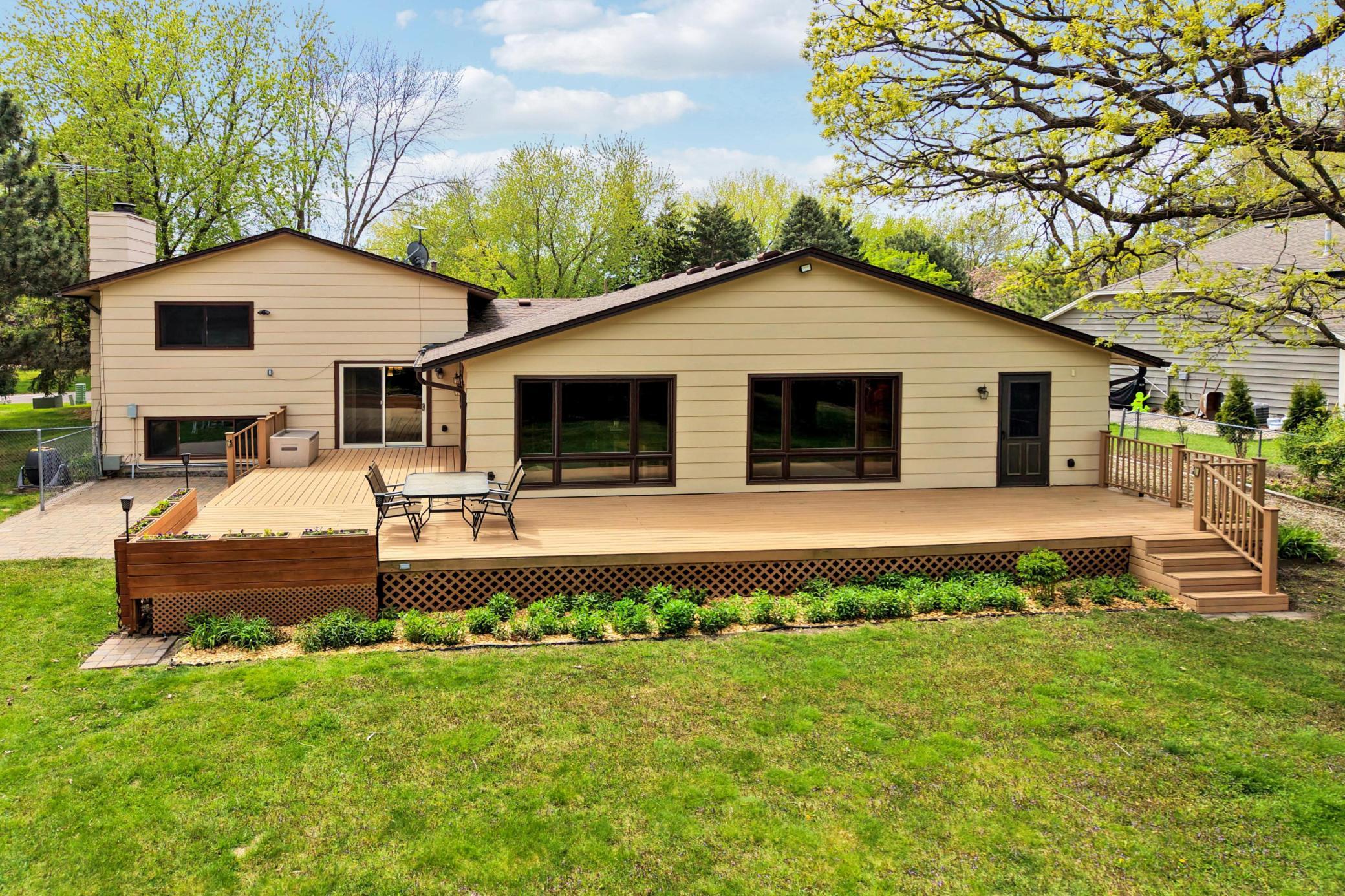 Large wrap around deck with planter boxes.