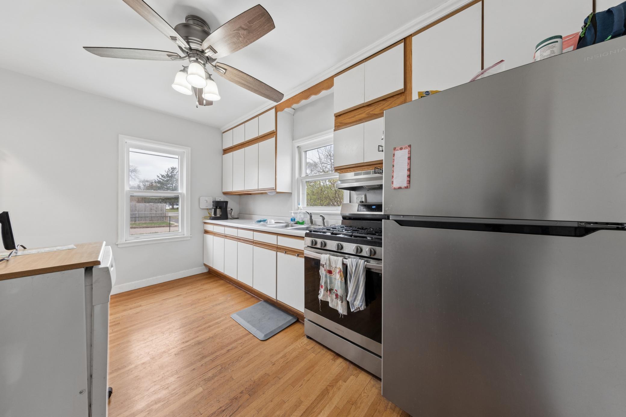 Functional kitchen with ample cabinetry, gas range, and plenty of counter space.
