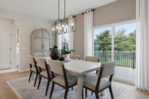 Stunning cafe off the kitchen with beautiful windows