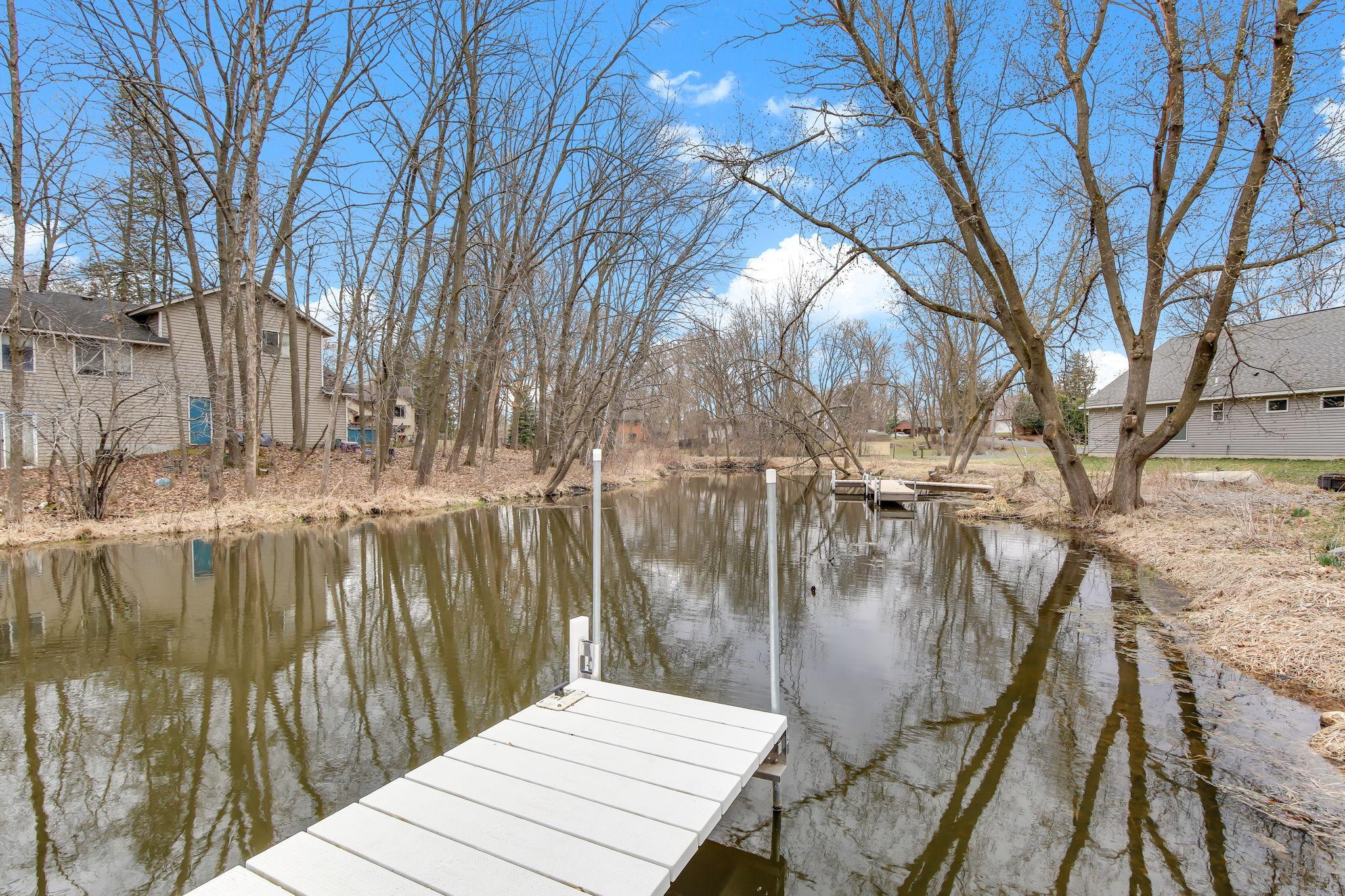 Quiet hidden channel with 120' of water frontageon Forest Lake great for fishing and enjoying nature