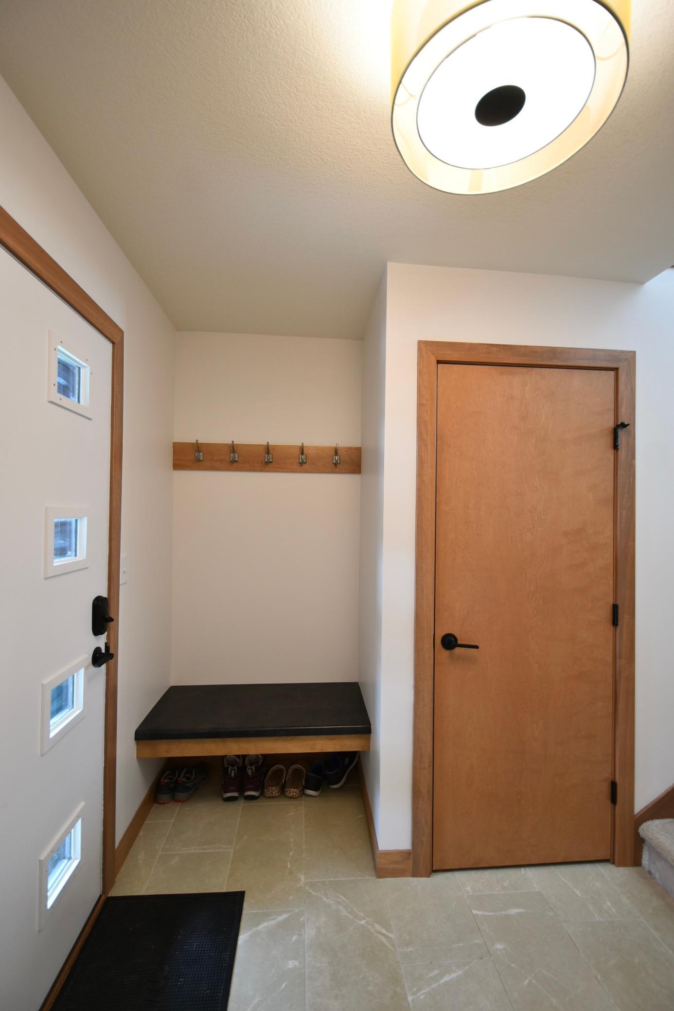 custom built-in bench in front entry