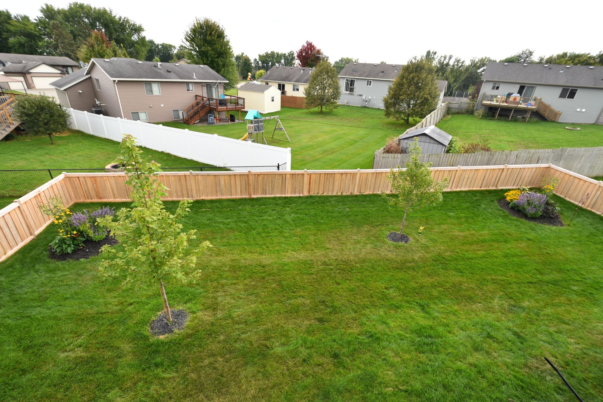 Newly installed cedar fen ce