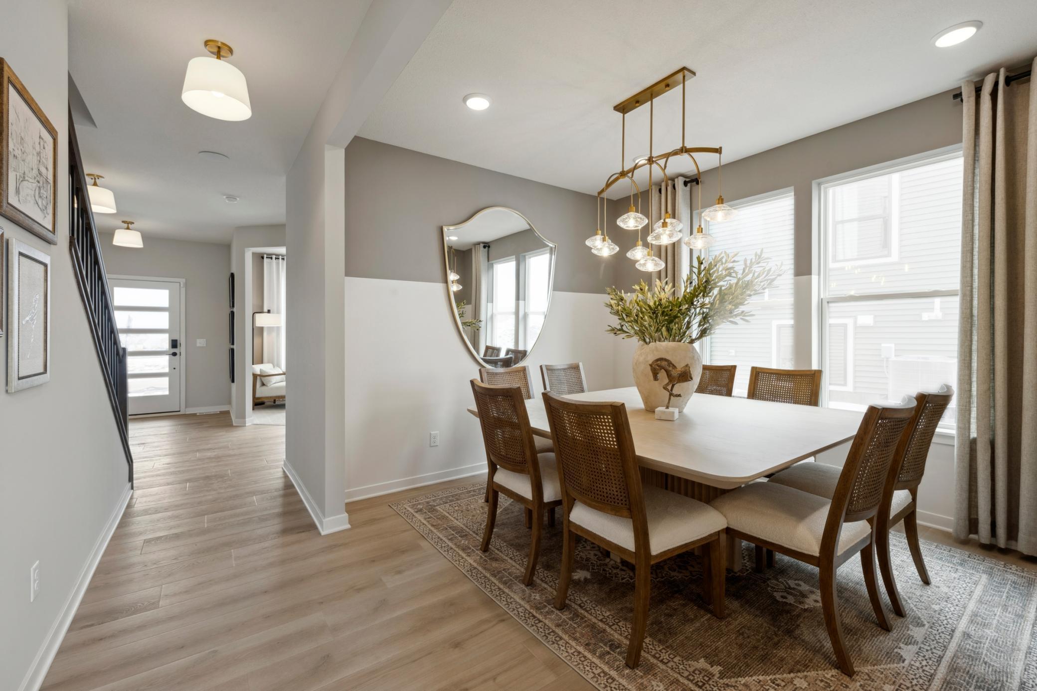 Elegant dining room with ample space for gatherings, perfect for both everyday meals and special occasions.