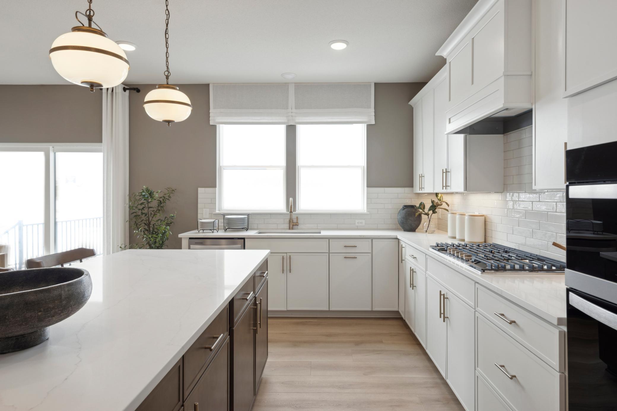 Ample room in the kitchen with plenty of cabinets.