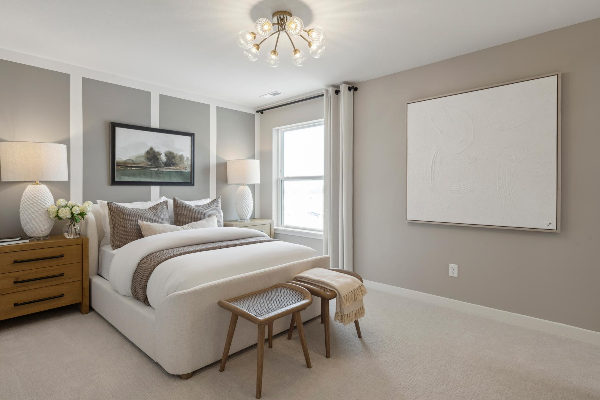 Thoughtfully proportioned layout provides plenty of space for a bed, nightstands, and a dresser, while maintaining an open, uncluttered feel.