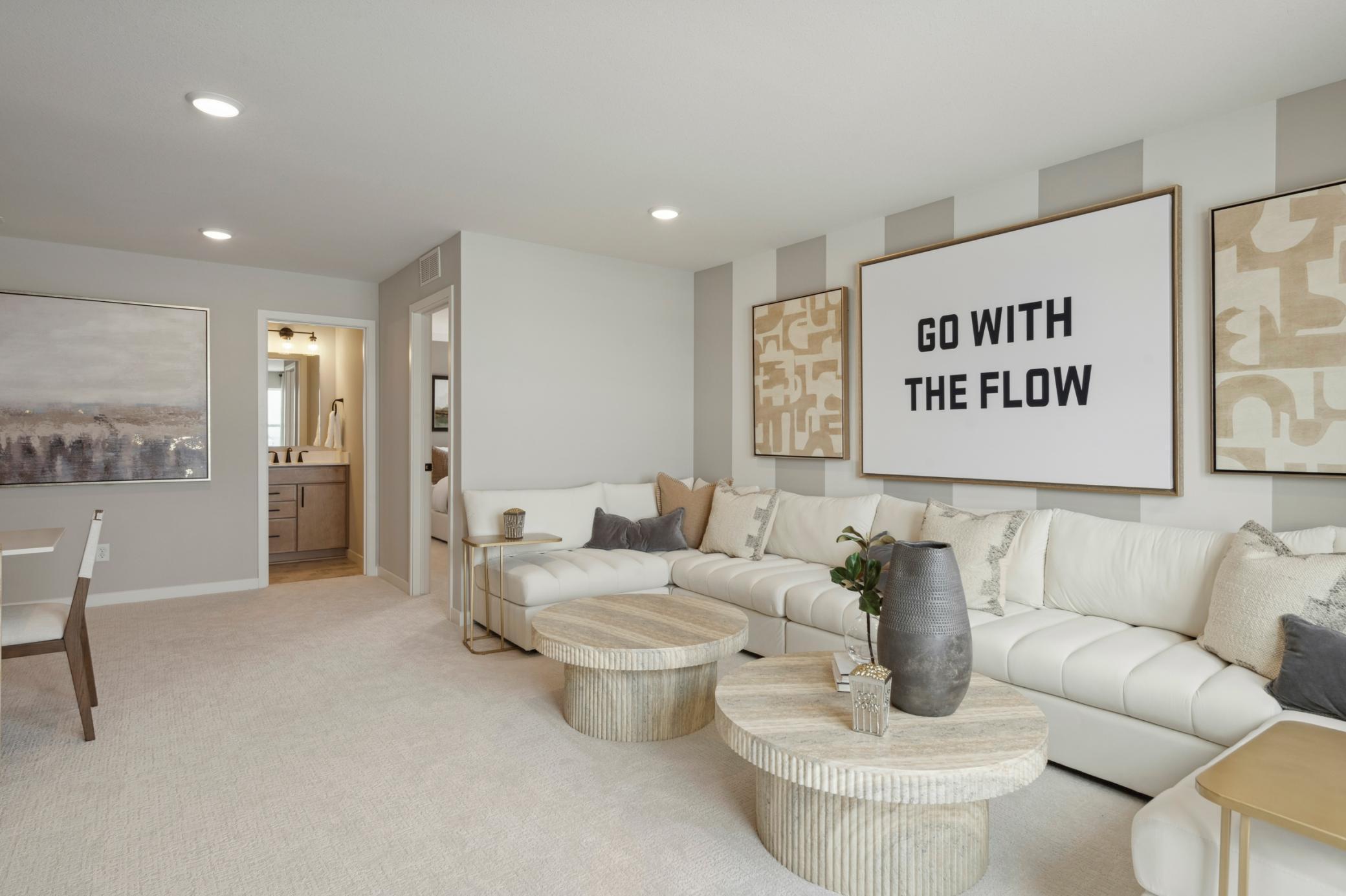 Loft’s open layout connects effortlessly to surrounding rooms, providing a bright and inviting upper-level retreat.