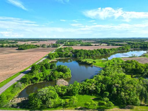 Tucked into a beautiful natural setting, this 8.93-acre parcel overlooks a tranquil environmental lake.