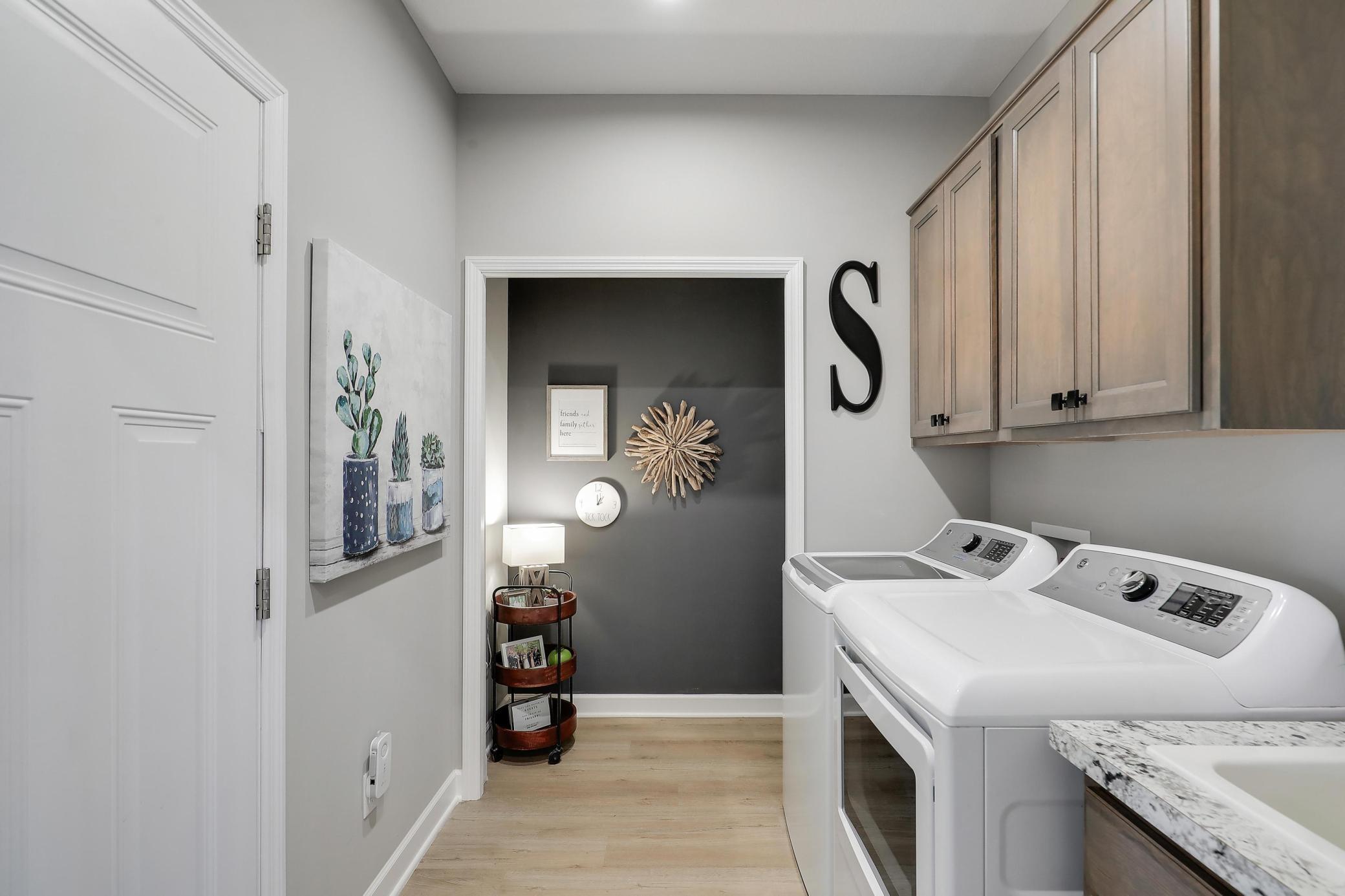 Laundry area and storage off of the garage entry.