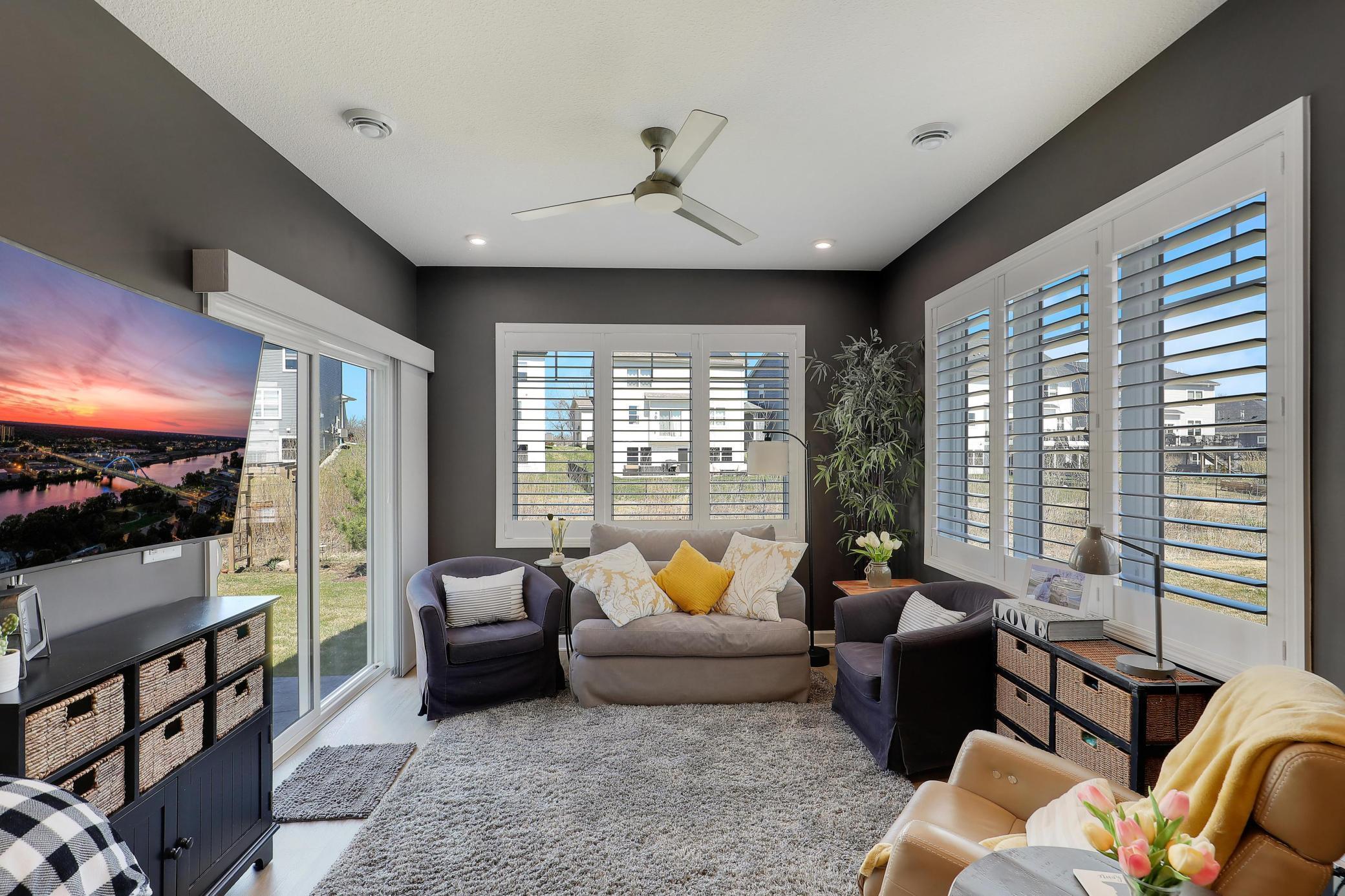 Beautiful sunroom that leads to back patio.
