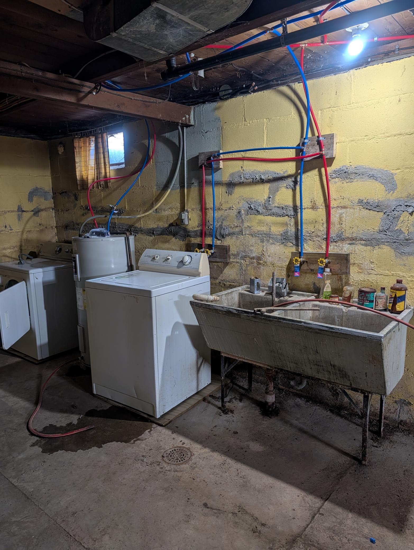 Laundry area with new plumbing