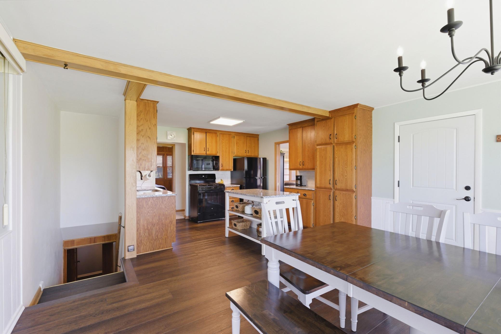 Kitchen flows to informal dining/family room