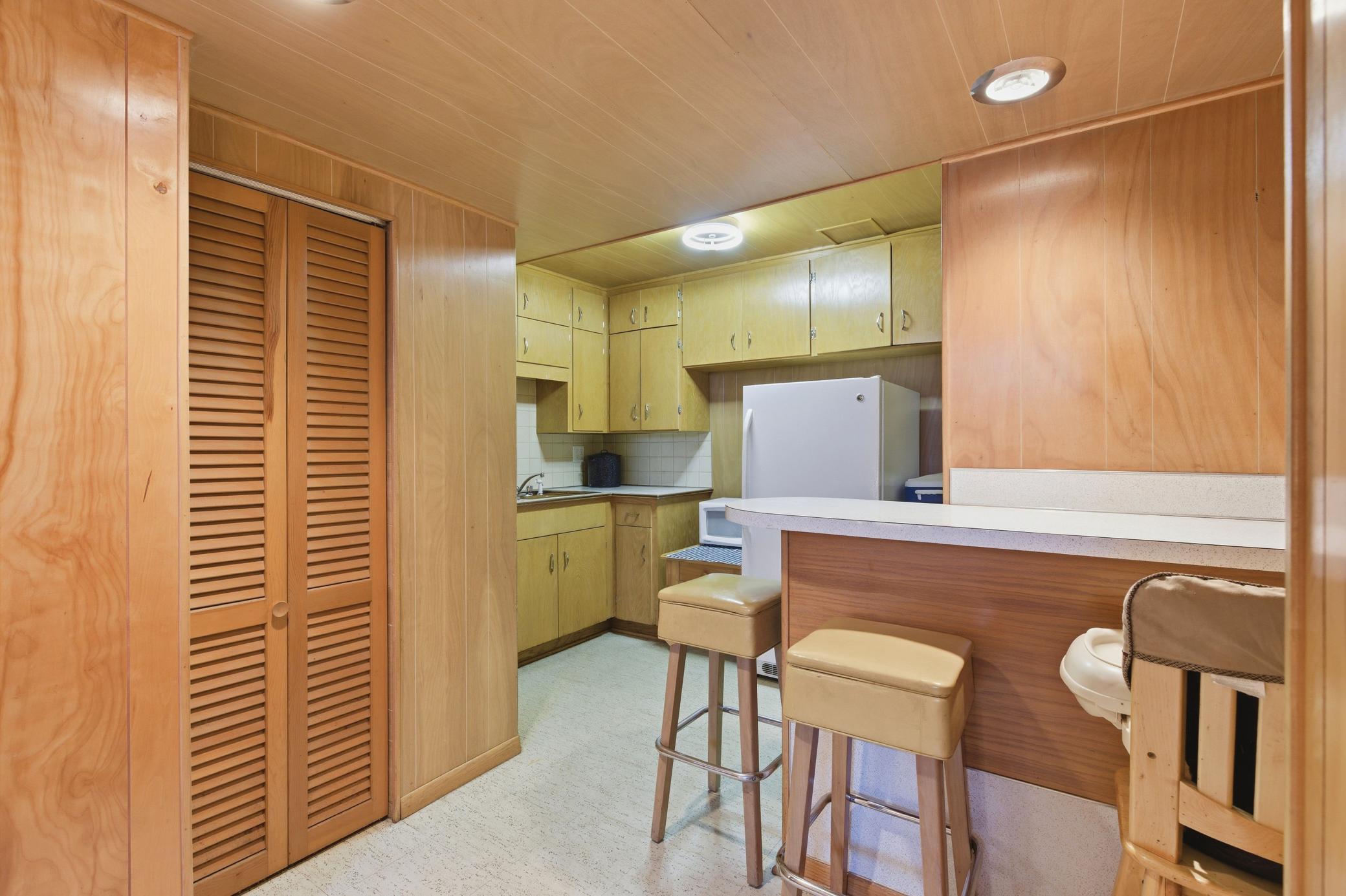 Wet bar and kitchenette off Amusement room