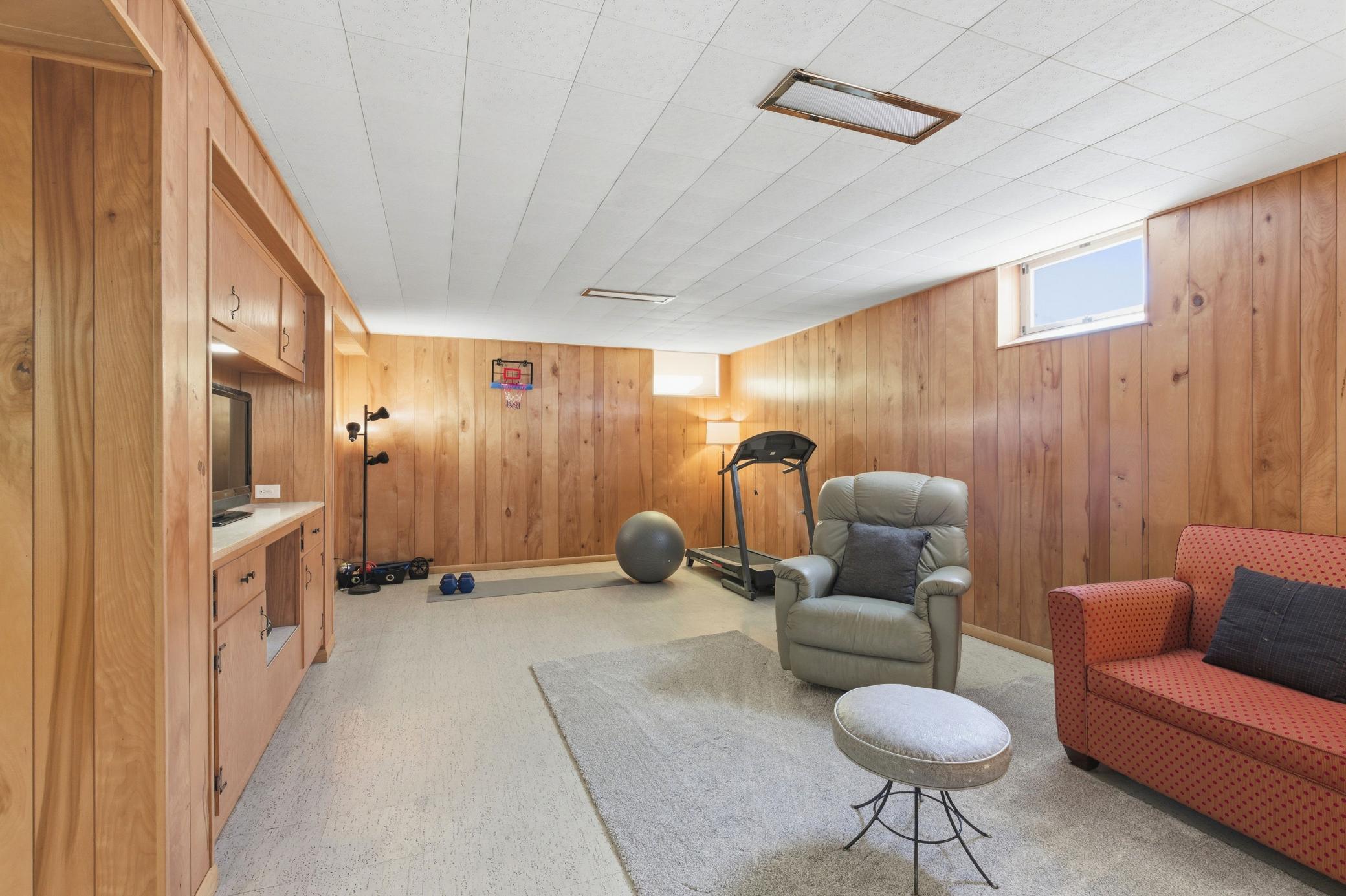 Amusement room is perfect for exercise, movie or game night.