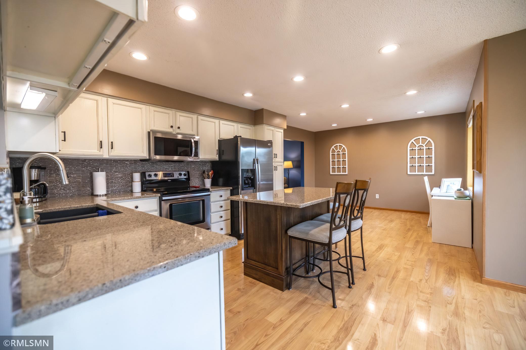 Open kitchen facing informal dining