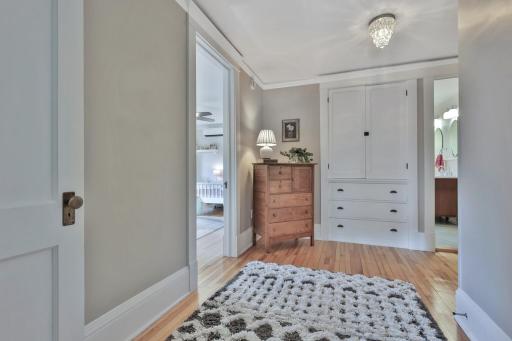 Upstairs hallway with classic built-in storage