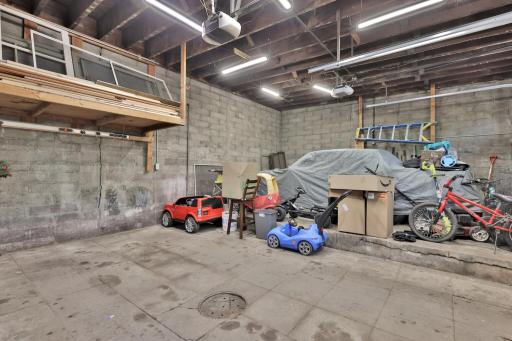 Convenient rear alley access to the original 1910 brick garage. A well-maintained, private entry point that offers easy two-car parking while preserving the home's impressive historic curb appeal.