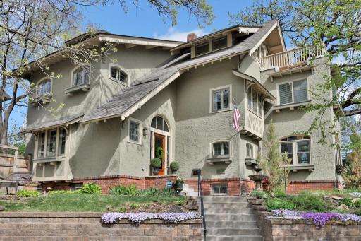 A spectacular first impression! An extra-long, gently sloped sidewalk leads you toward this historic masterpiece. Framed by mature oaks, the homeâs striking gabled architecture and timeless charm are on full display.