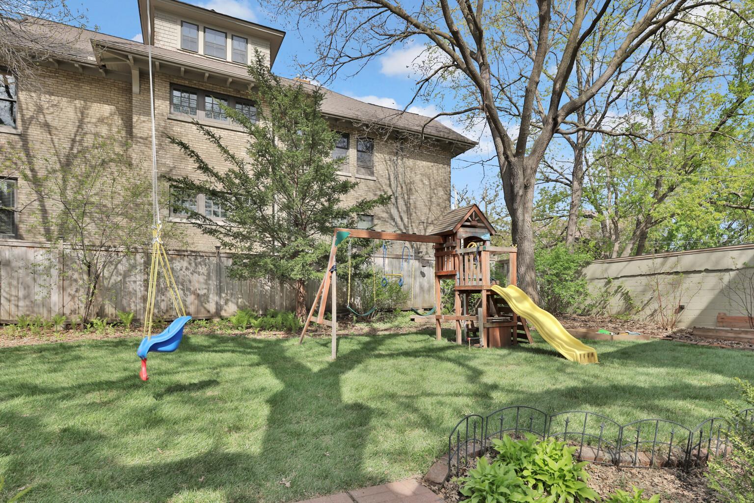 Deep, park-like lot featuring towering trees and exceptional privacy. This spacious backyard provides a comfortable buffer from neighbors and a beautiful, shaded canopy—perfect for family fun and peaceful outdoor living.