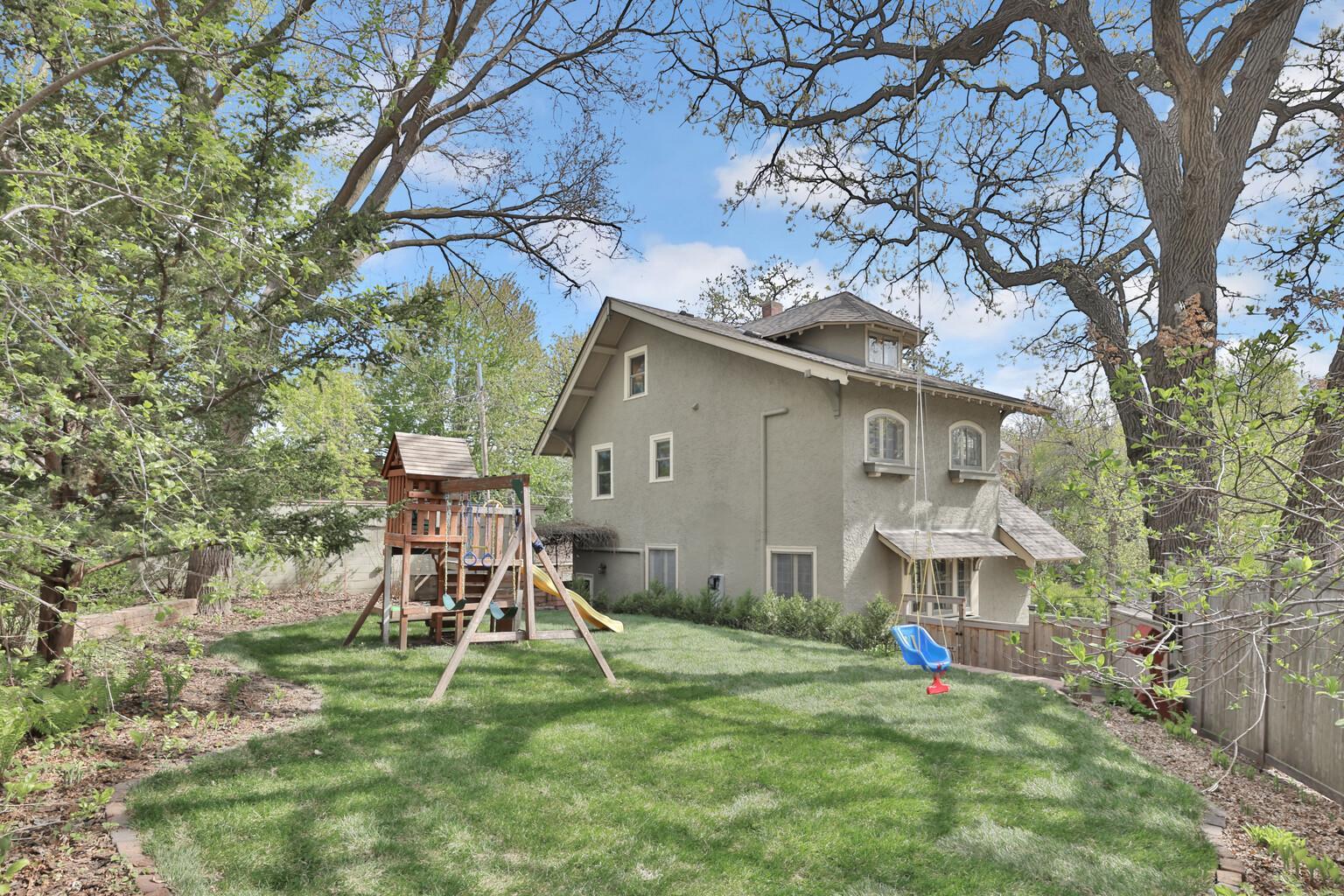 Deep, park-like lot featuring towering trees and exceptional privacy. This spacious backyard provides a comfortable buffer from neighbors and a beautiful, shaded canopy—perfect for family fun and peaceful outdoor living.