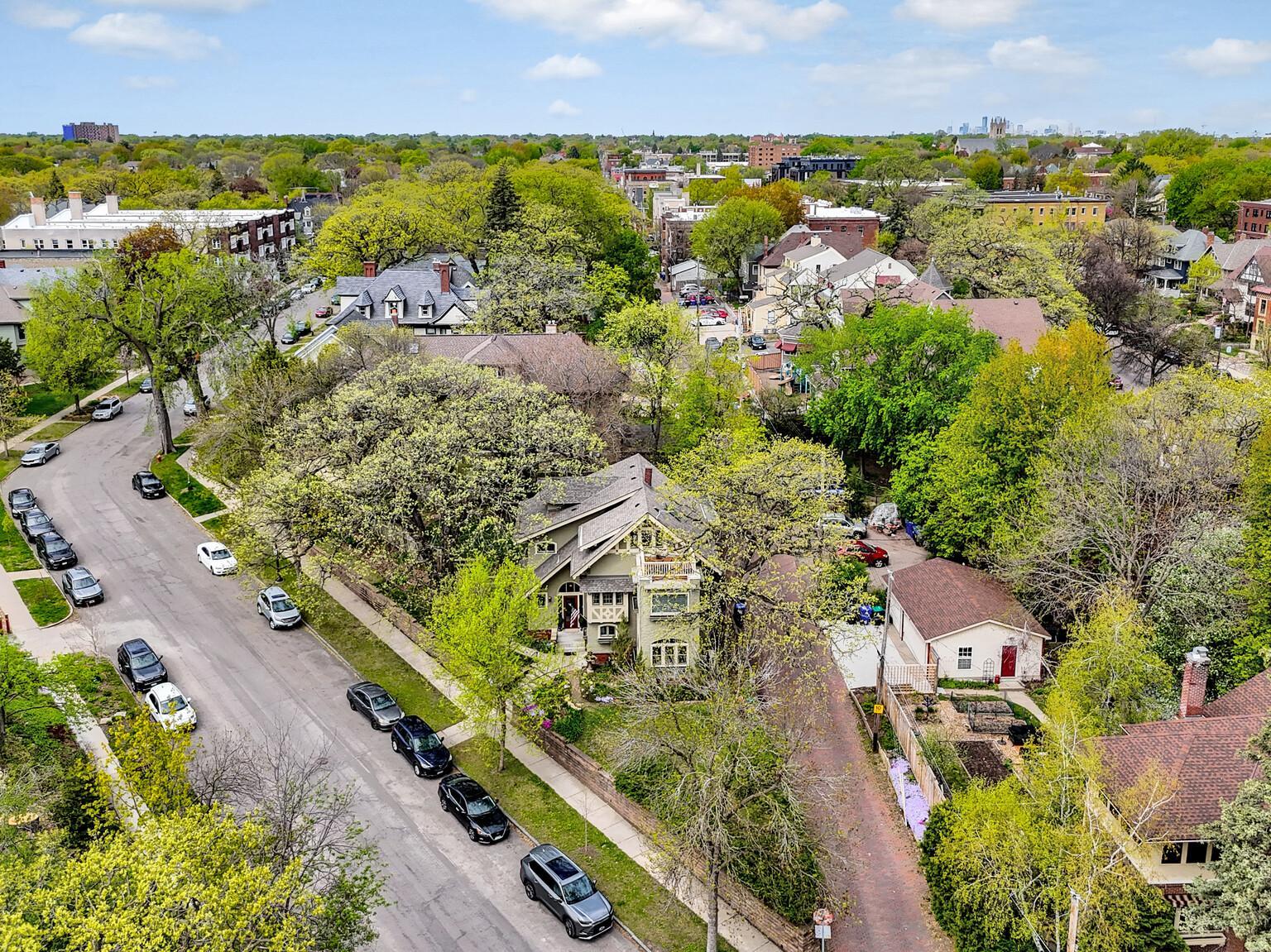 A spectacular first impression! An extra-long, gently sloped sidewalk leads you toward this historic masterpiece. Framed by mature oaks, the home’s striking gabled architecture and timeless charm are on full display.