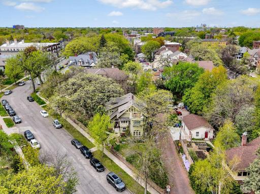 A spectacular first impression! An extra-long, gently sloped sidewalk leads you toward this historic masterpiece. Framed by mature oaks, the homeâs striking gabled architecture and timeless charm are on full display.