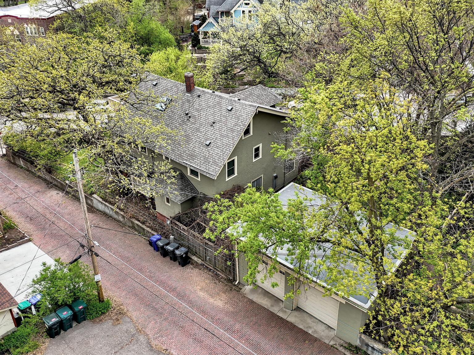 Convenient rear alley access to the original 1910 brick garage. A well-maintained, private entry point that offers easy two-car parking while preserving the home's impressive historic curb appeal.
