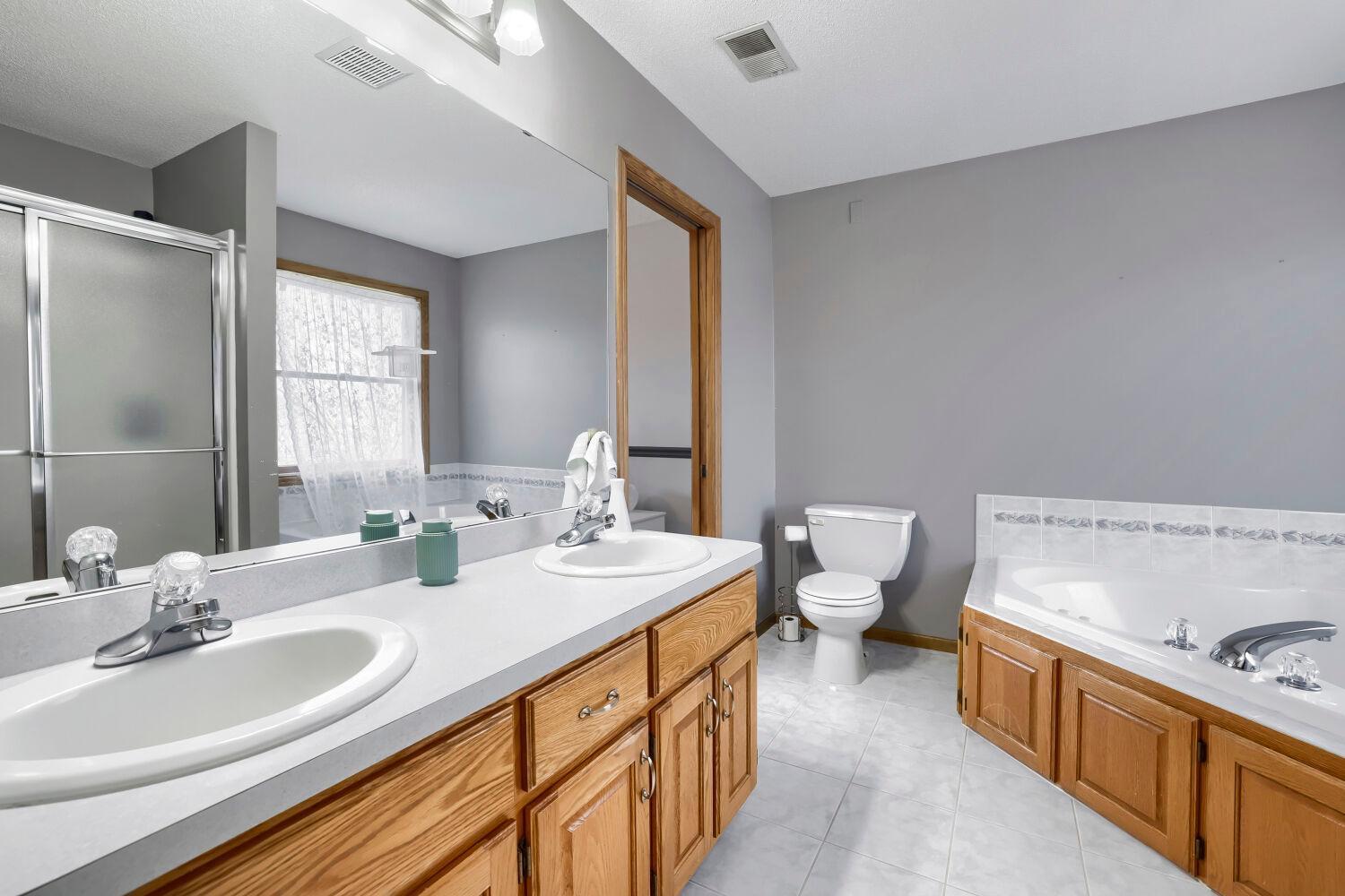 22171 Jason Ave N - Web Quality - 020 - 16 Primary Bedroom.jpg