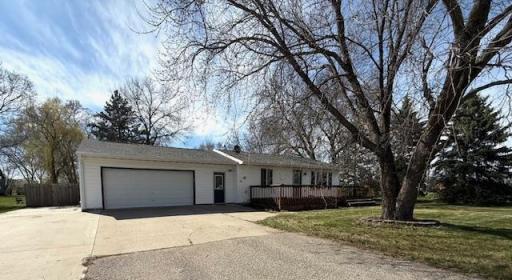 18' x 18' Deck, 12' x 22' Concrete parking area on side of Garage.