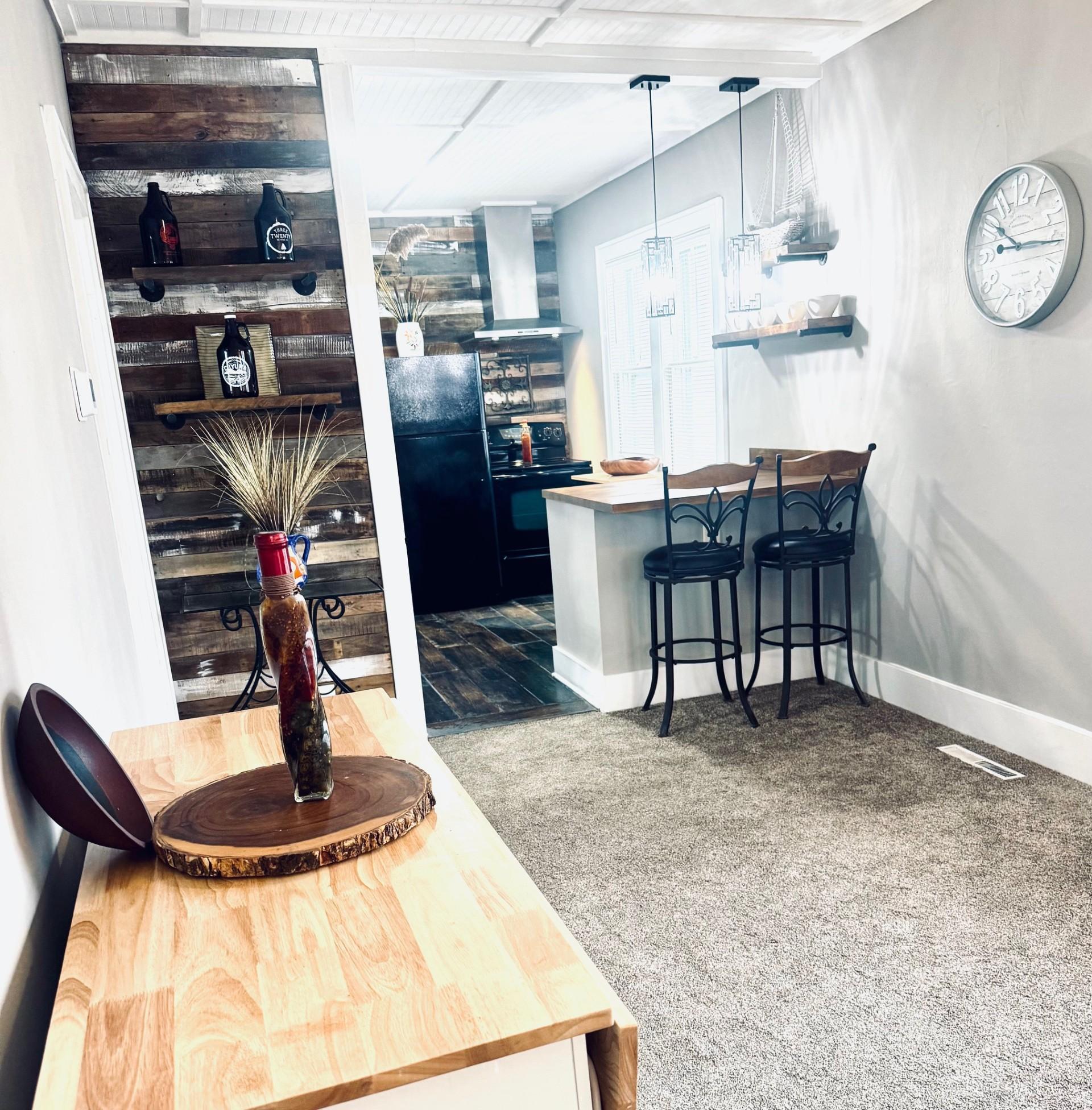 Living room opens into kitchen