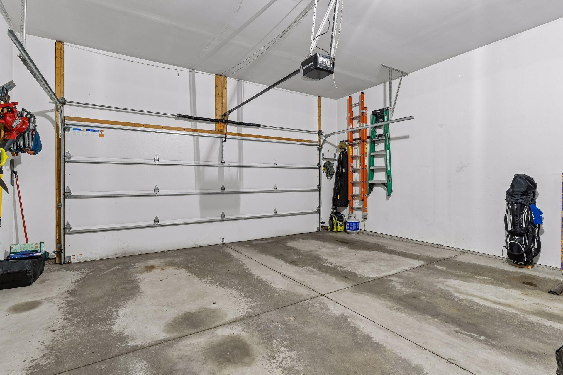 Bright and clean! The two car garage will help keep you organized.