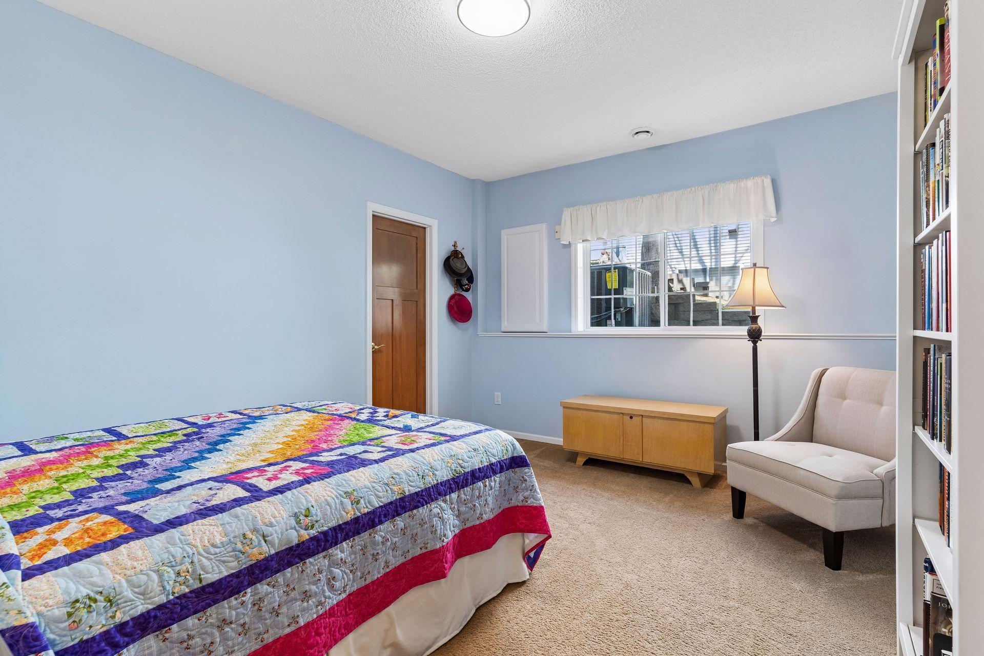 The second lower level Bedroom enjoy tons of natural light and a walk-in closet.