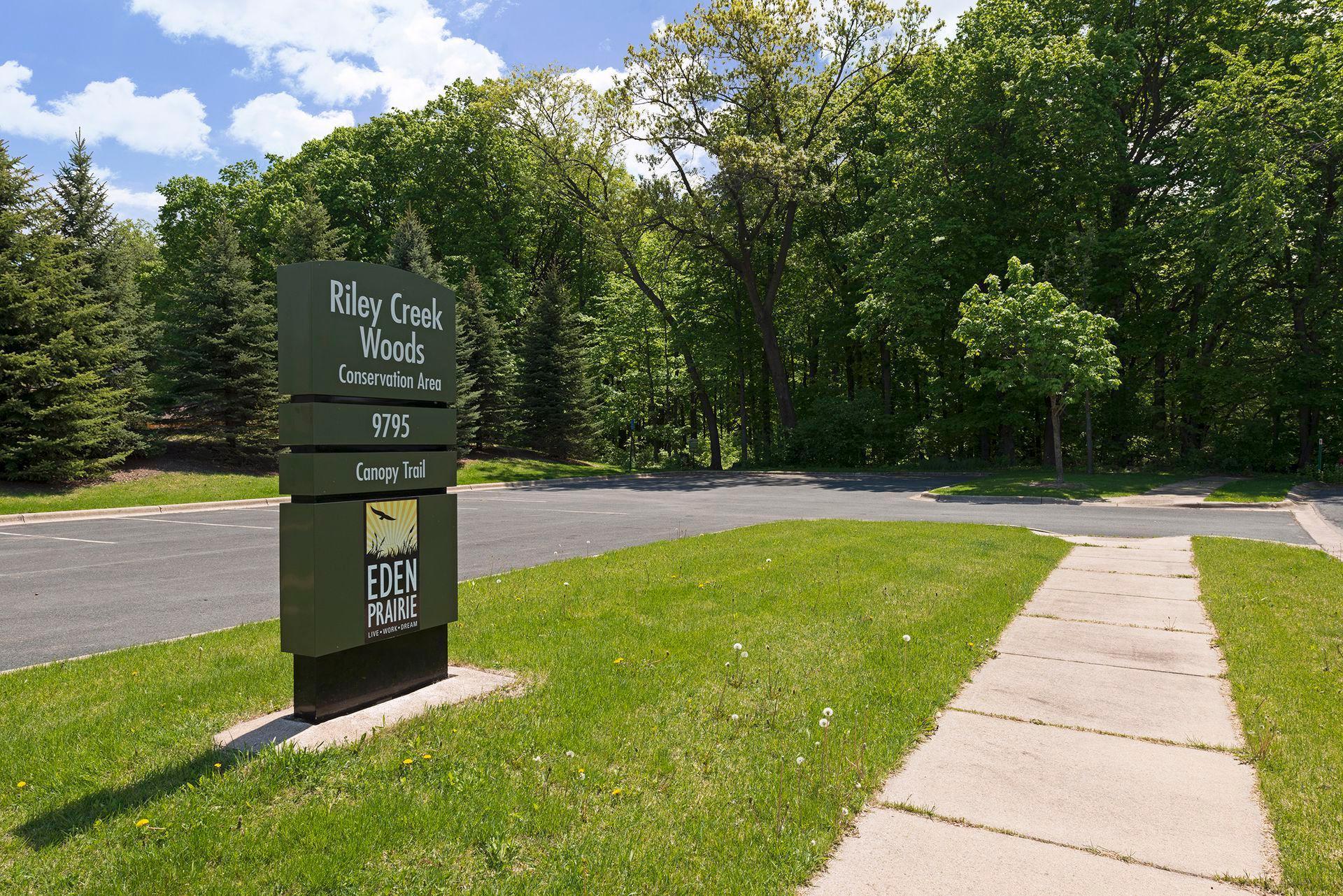 Steps from your front door is the Riley Creek Woods Conservation Area.