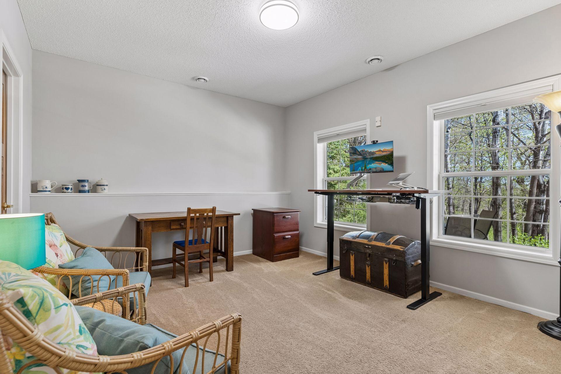 One of the lower level Bedrooms looks out to the backyard and features a large, walk-in closet.