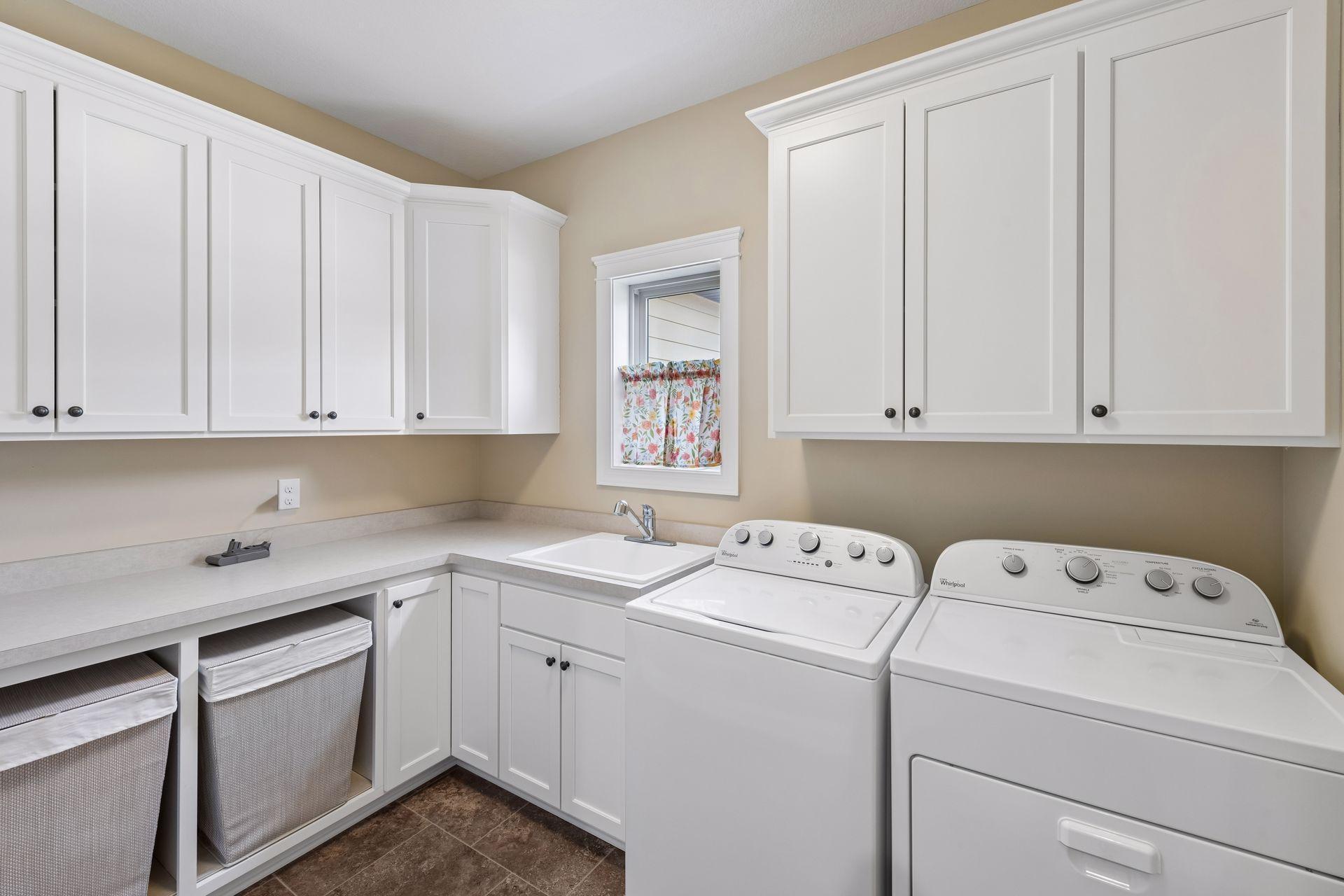 Laundry space, cabinets