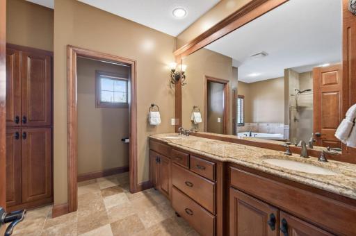 Primary En Suite. Double vanity, granite tops, marble floors