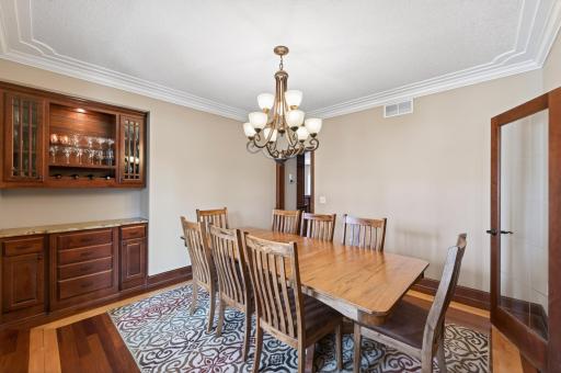 Formal dining room, cumura flooring with maple in lay, built in buffet with granit counter top