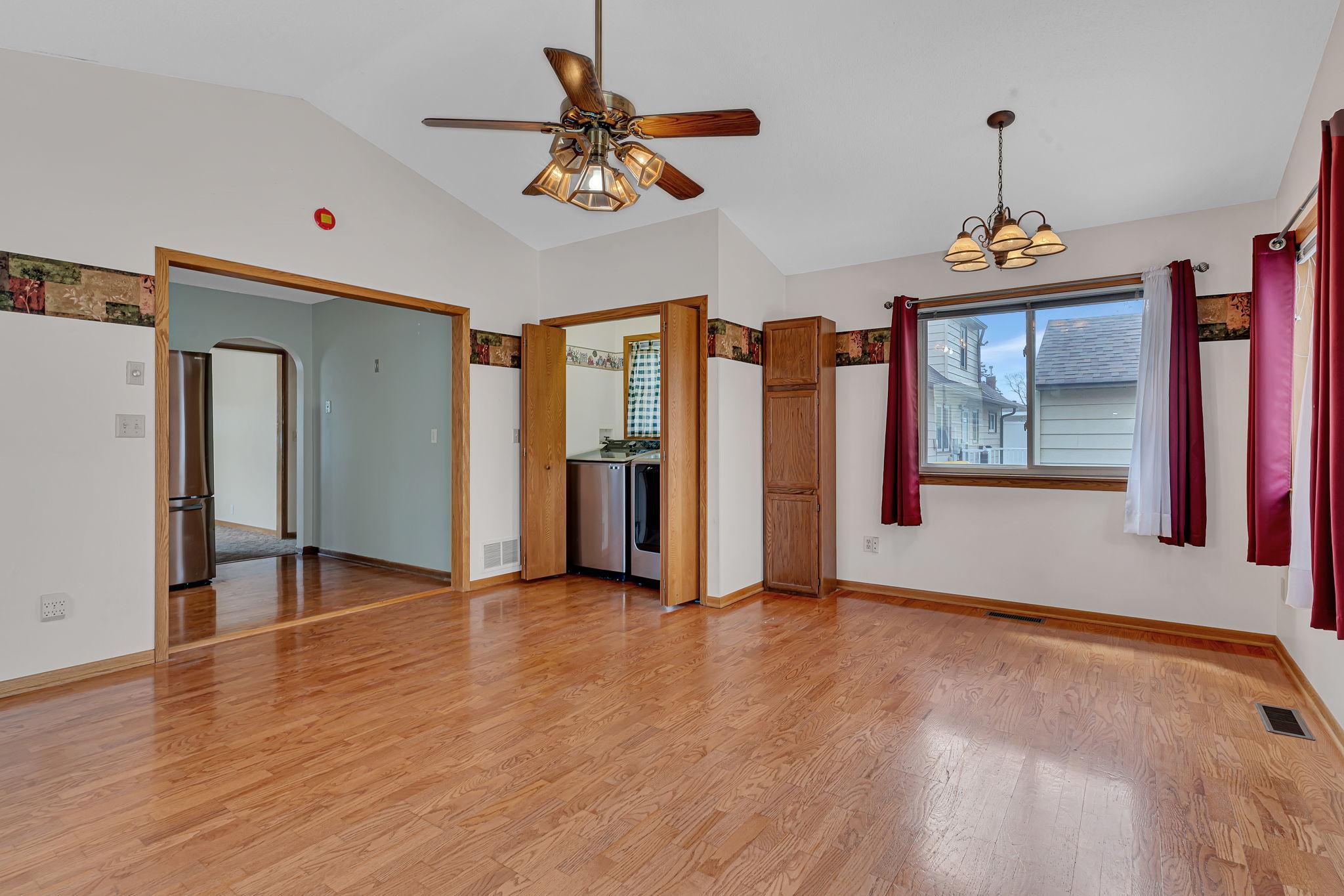 813- Addition off of Kitchen. Could be used as a Living Room, or Dining Room. Main Floor Laundry!