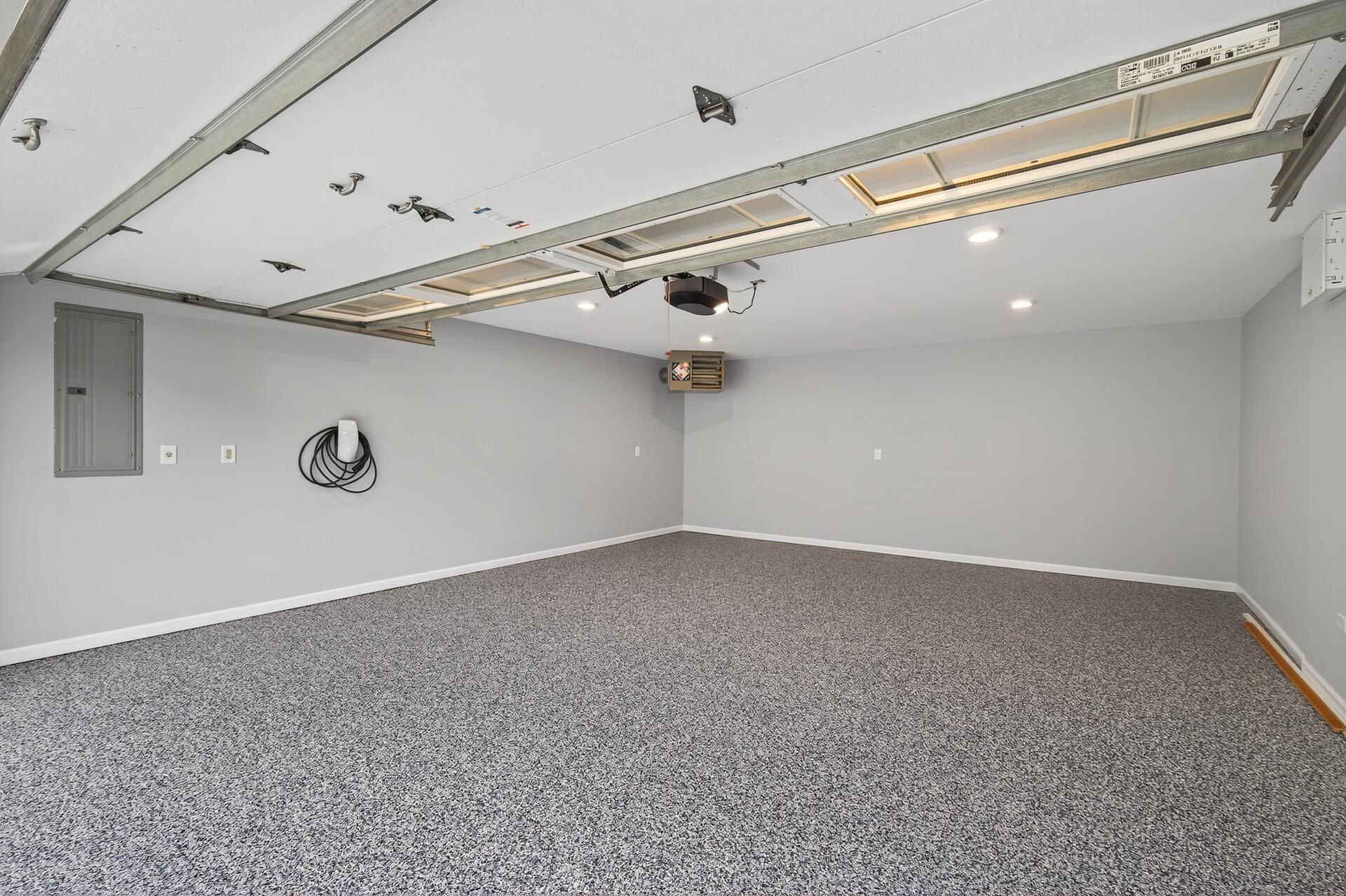 Finished Upper Garage with EV Charger and Garage Heater