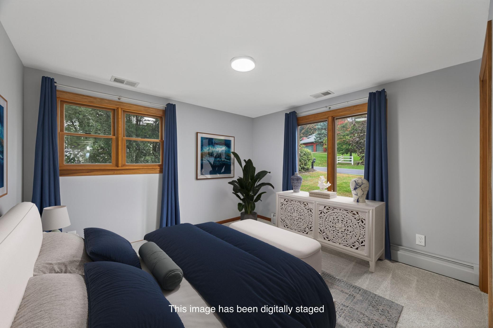 Main Level Bedroom *Digitally Staged*