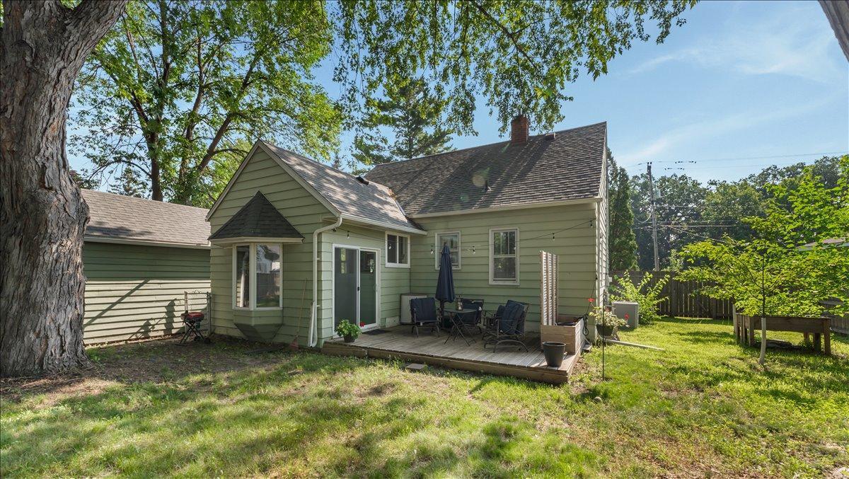 Backyard patio with fenced in backyard